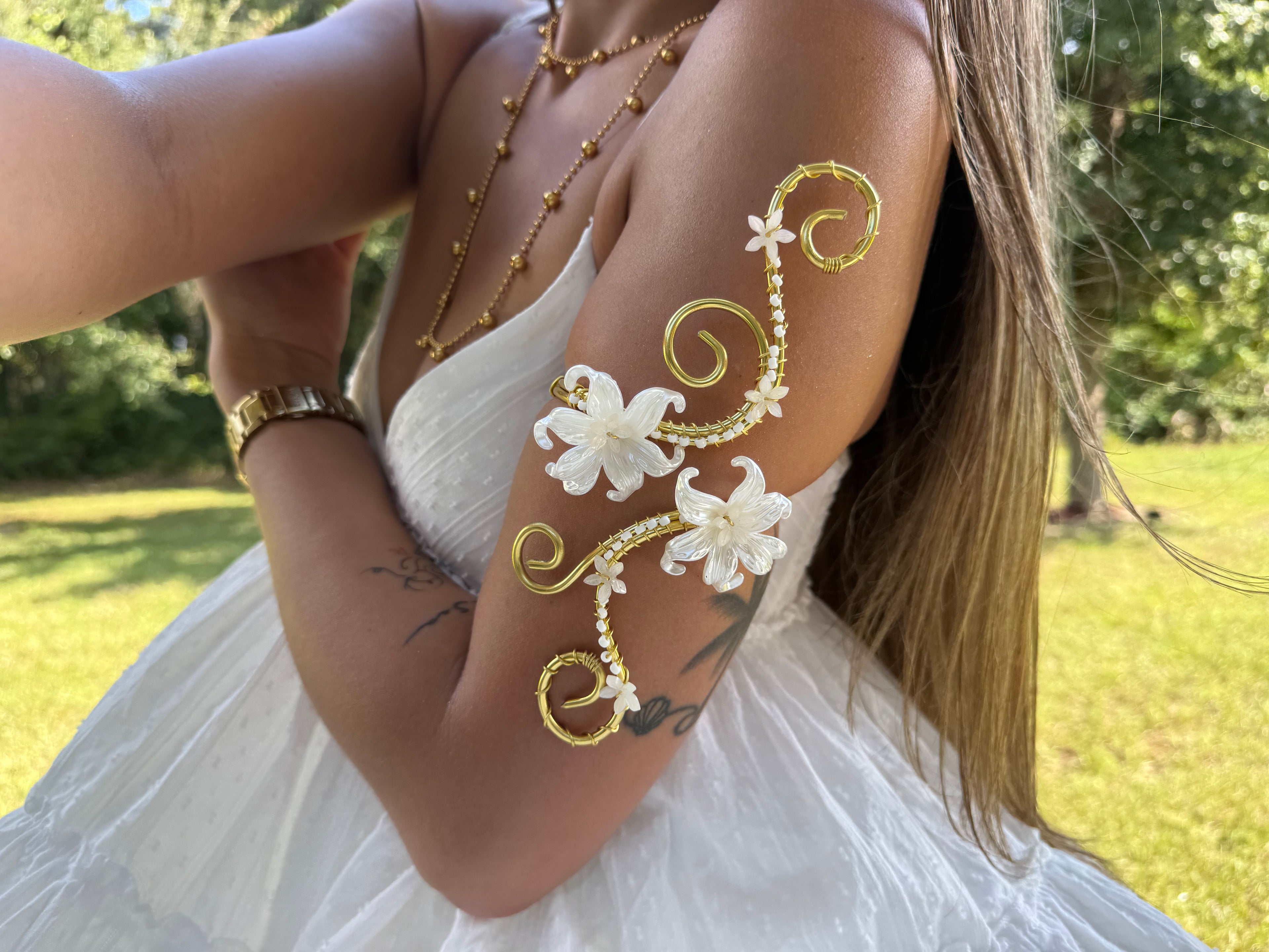 Lady in white arm cuff