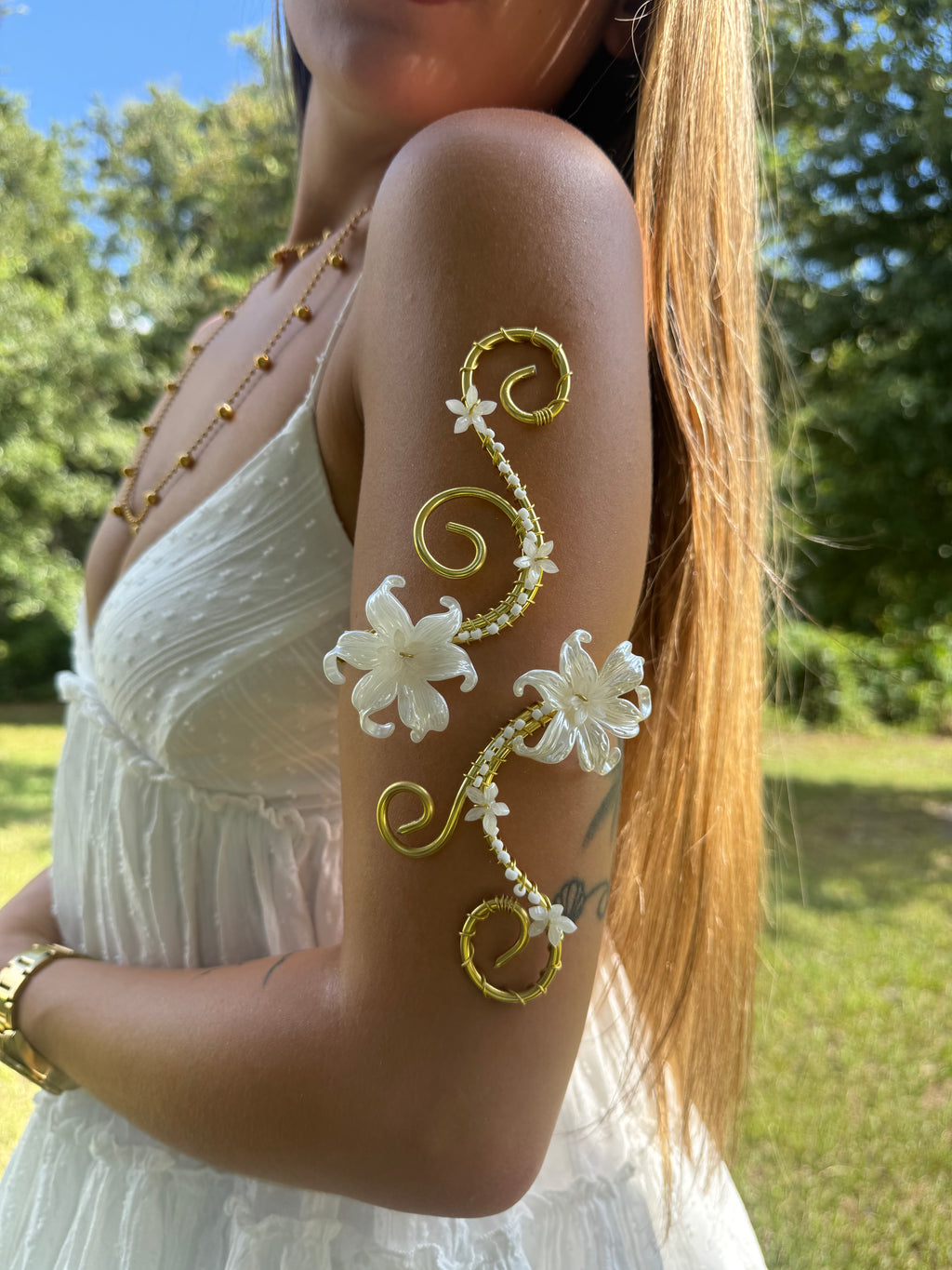 Lady in white arm cuff